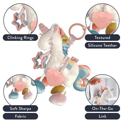Itzy Ritzy Link & Love Toy for Stroller or Car Seat; Features Textured Ribbons, Crinkle Sounds, Clinking Rings & Silicone Teether; Designed For Ages 0 Months and Up (Unicorn)