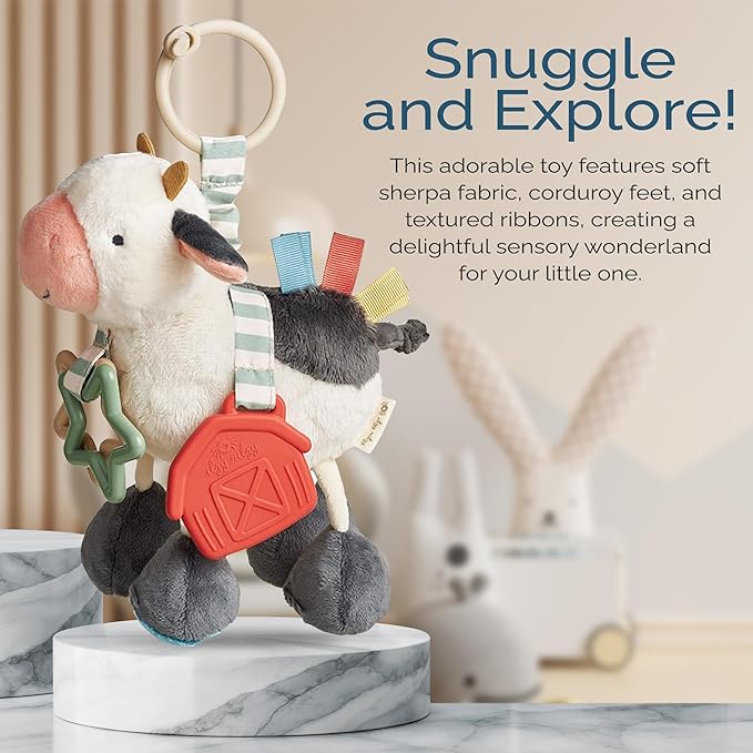 Itzy Ritzy Link & Love Toy for Stroller or Car Seat; Features Textured Ribbons, Crinkle Sounds, Clinking Rings & Silicone Teether; Designed for Ages 0 Months and Up (Cow)