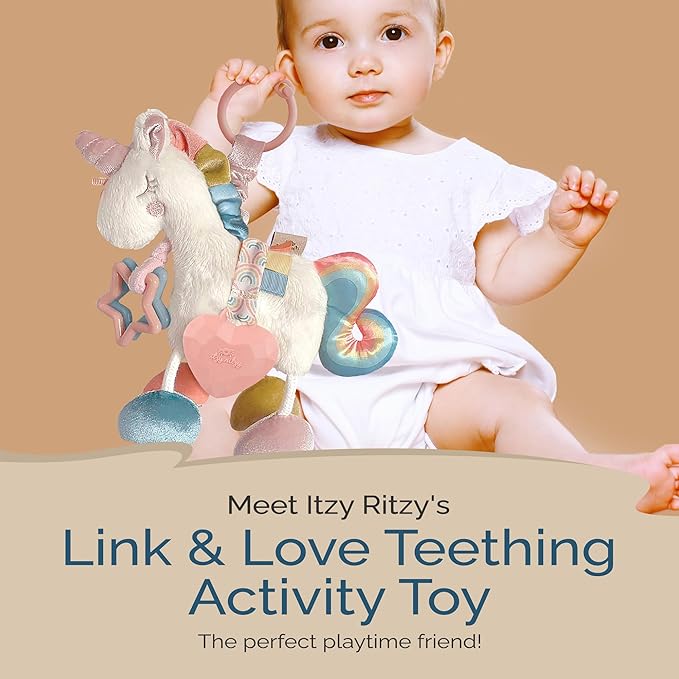 Itzy Ritzy Link & Love Toy for Stroller or Car Seat; Features Textured Ribbons, Crinkle Sounds, Clinking Rings & Silicone Teether; Designed For Ages 0 Months and Up (Unicorn)