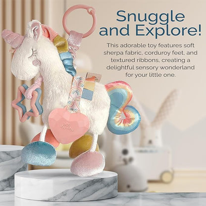 Itzy Ritzy Link & Love Toy for Stroller or Car Seat; Features Textured Ribbons, Crinkle Sounds, Clinking Rings & Silicone Teether; Designed For Ages 0 Months and Up (Unicorn)